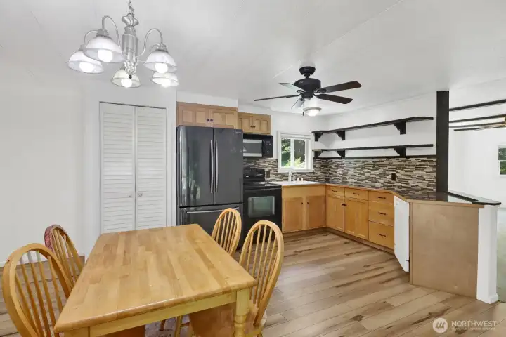 Dining and kitchen areas connected for practical everyday living.