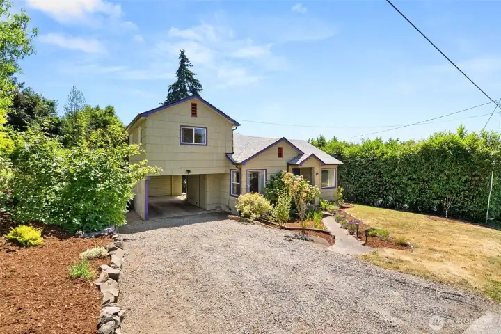 Large Driveway with Carport.