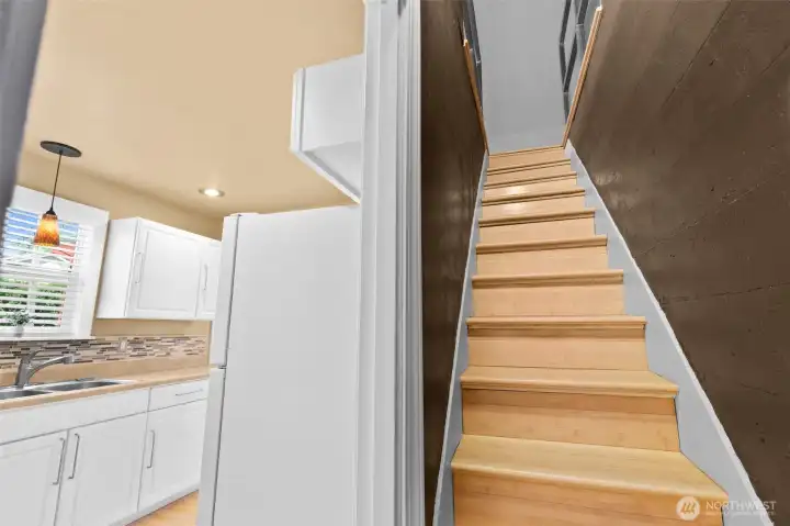 Stairs from Kitchen and BAck Entrance to the Bonus Room upstairs tha can also be used as a rental opportunity for "House Hacking!"
