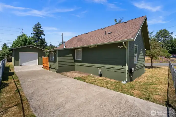 Plenty of Driveway Parking that is Fenced In! You can fit 3 cars, maybe 4 if they are small!