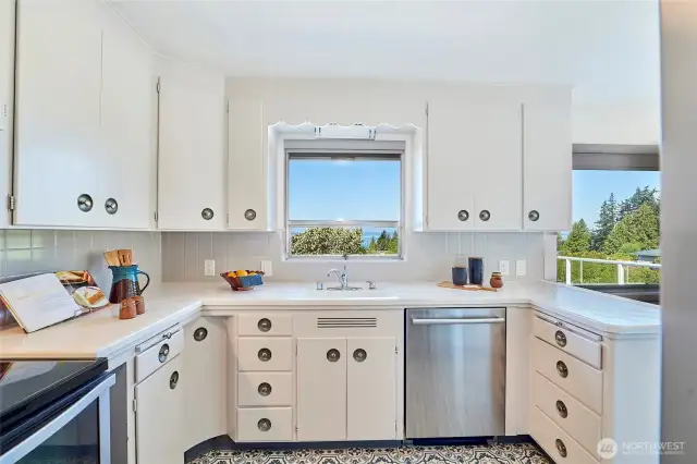 Kitchen with access to large deck.