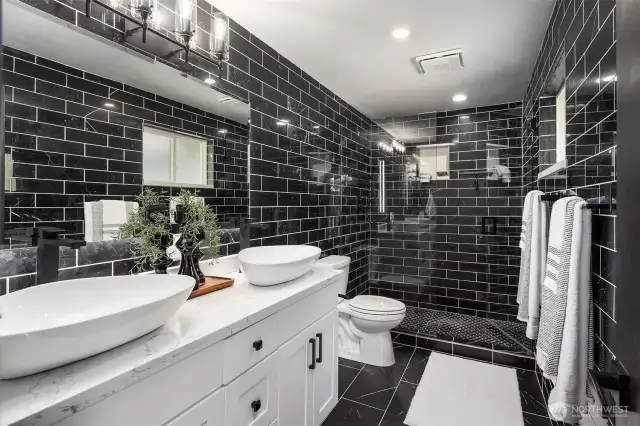 All 3 bathrooms have gorgeous custom tile work.
