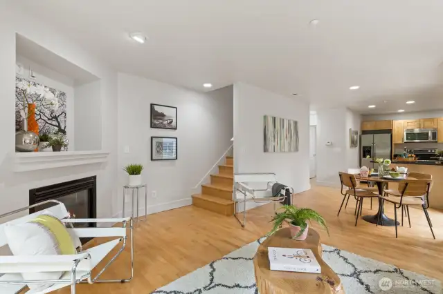 Looking back from the main balcony in at this wonderfully welcoming home, revel in the stunning hardwood flooring and fresh designer paint!