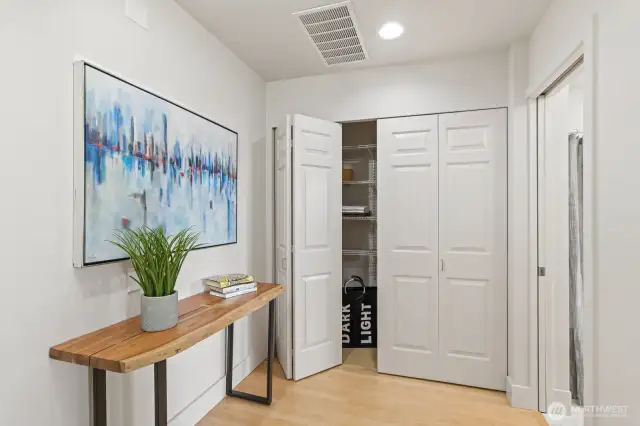 At the top of the stairs, this alcove is a perfect nook for your desk, a cozy nook for your favorite chair, laundry area folding space, or bookshelves!