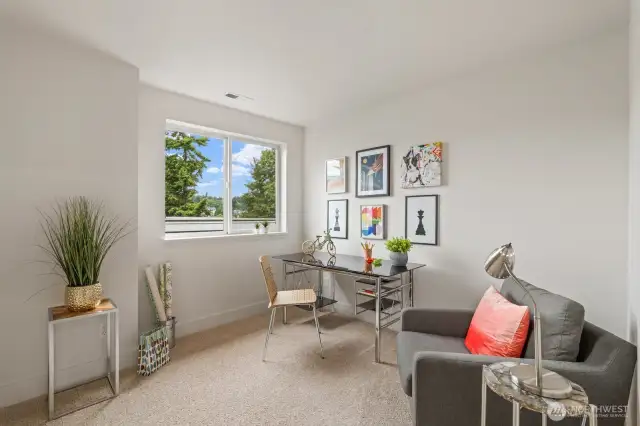 The second bedroom offers a perfect work from home space, an ample bedroom, an exciting craft room, or a thrilling game room! The sky is the limit on this bedroom's offerings.