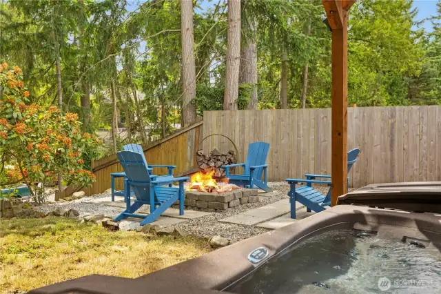 Backyard goals with built in fire pit & hot tub!