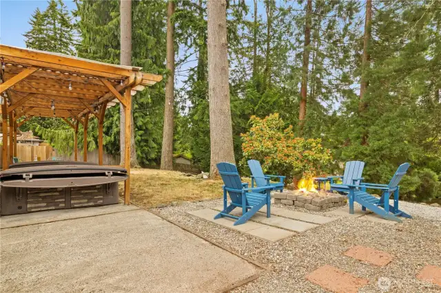 Backyard goals with built in fire pit & hot tub!