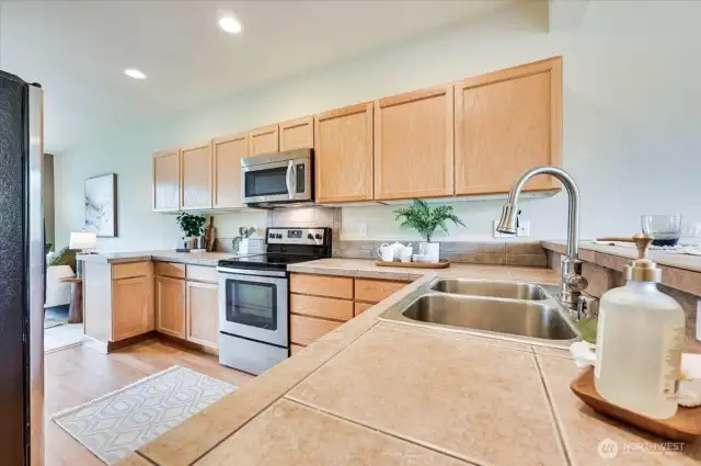 Pantry not seen in photo. Kitchen with eating bar