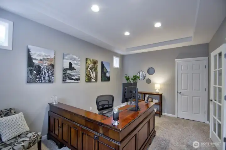 Main floor office with French doors. It could also double as a bedroom.