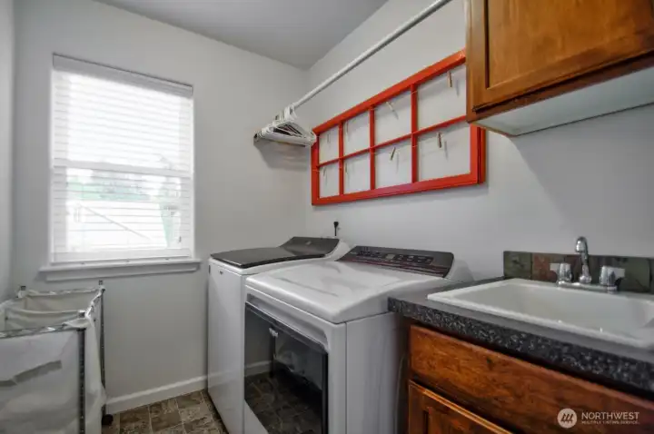 Upstairs laundry room.
