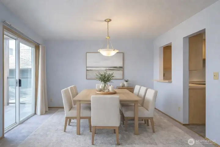 Enjoy the dining area with direct access to a private deck, offering serene views of Lake Steilacoom.