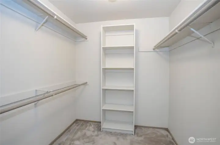 Spacious walk-in closet in the primary suite.
