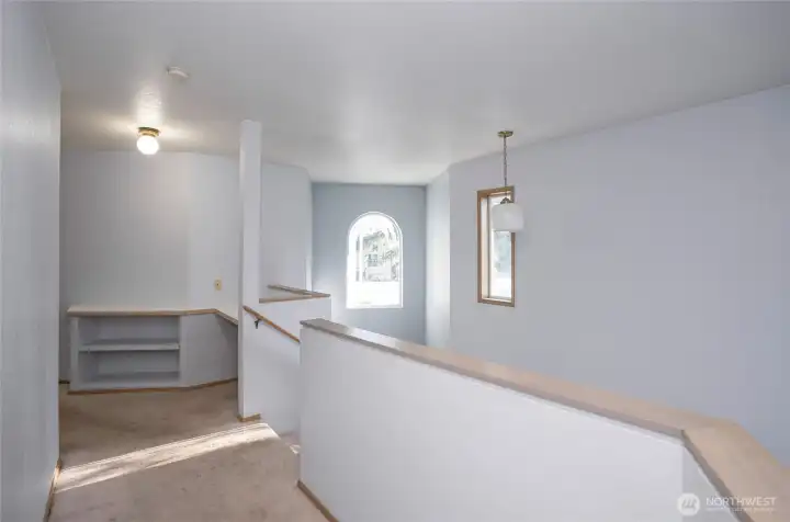 Upper-level landing offering a built-in workspace.