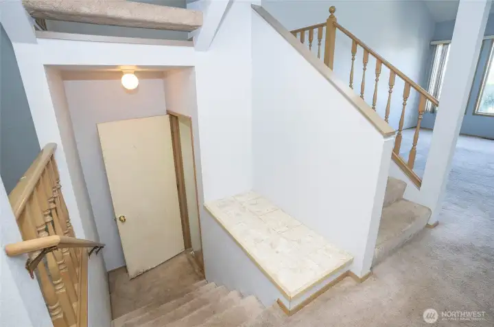 Downstairs to the lower level with family room, fourth bedroom, and full bath.