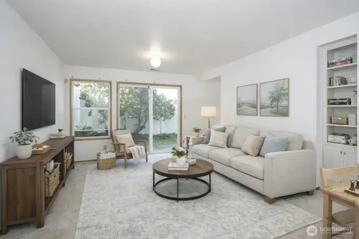 Family room on the lower level with direct access to the private outdoor space.