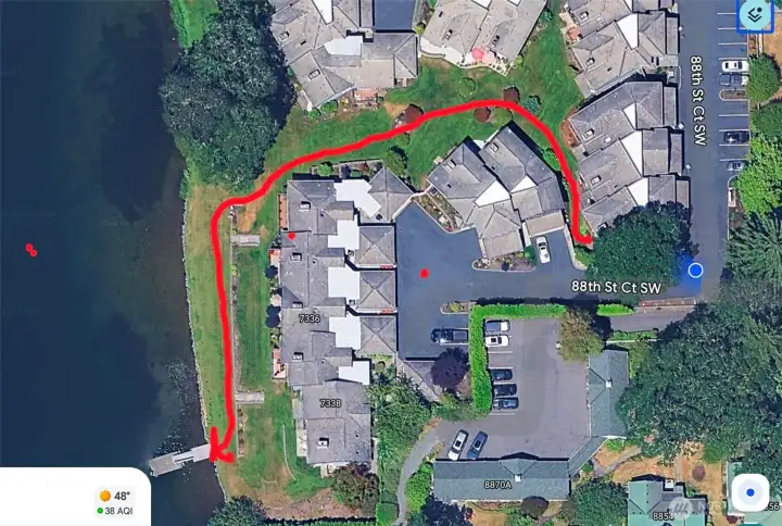 Path leading from the condo unit to the shared Lake Steilacoom dock.