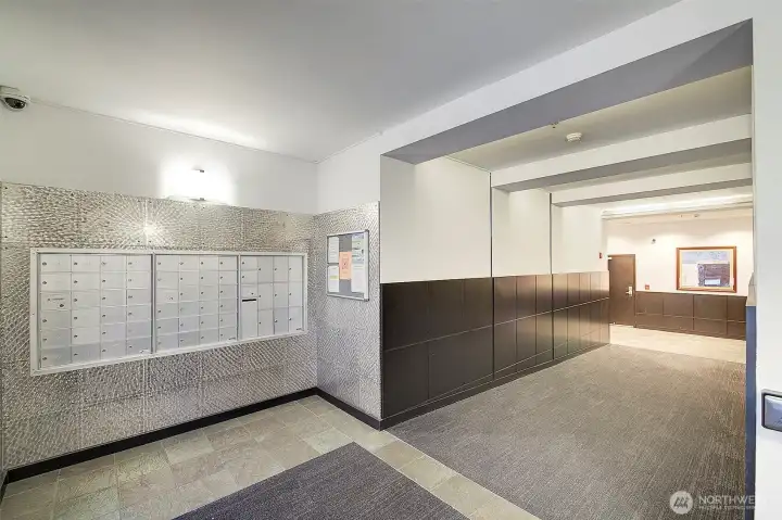 Elevators to the right, will take you all the way to the roof top deck, individual floors or parking garage.