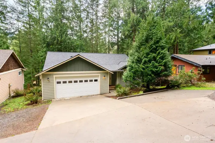 Gently sloped driveway for easy in/out access to the garage.