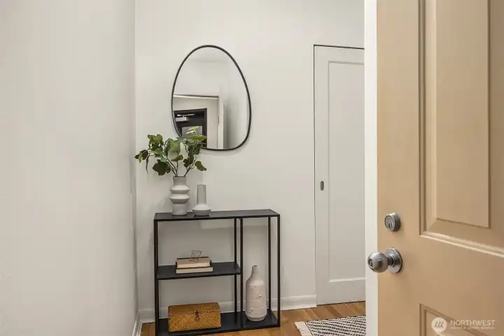 Welcome! Actual entryway with full size coat closet.