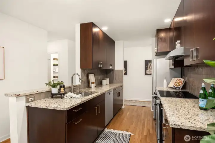 Granite counters and updated tile backsplash.