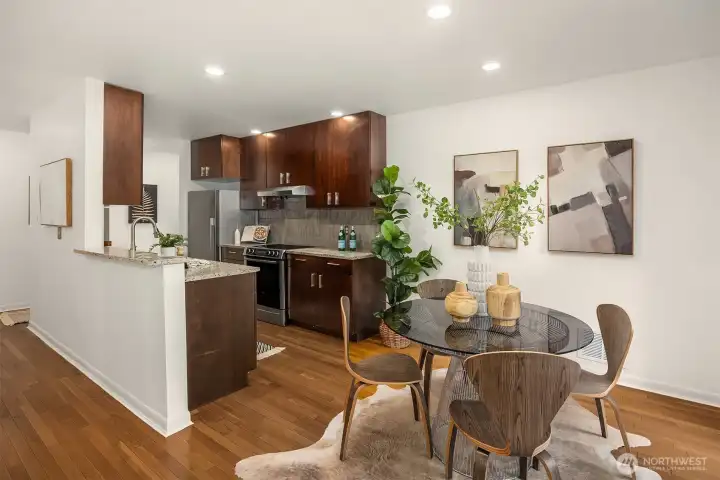 Dining area right off kitchen, and opens to small patio.