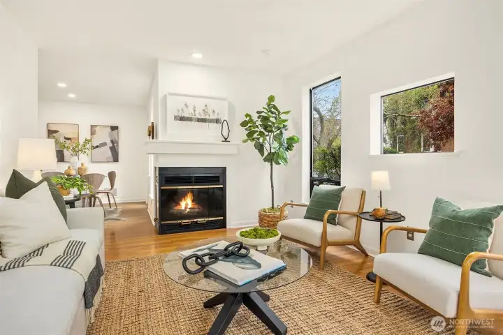 Generous living room with lots of light while maintaining privacy, and French doors that open to the larger of two patios.