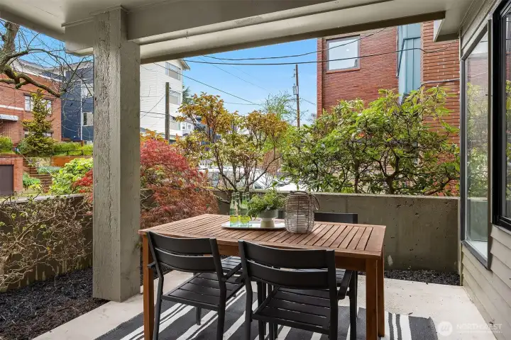 Larger covered patio with mature landscaping and plenty of room to host.