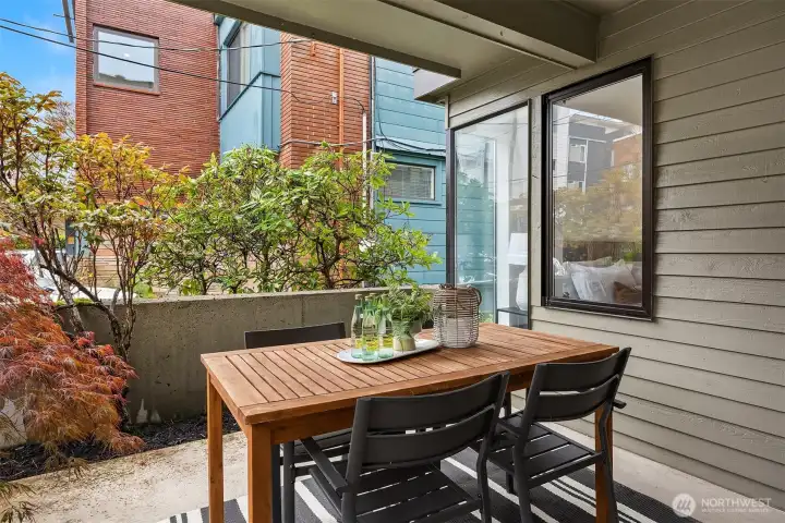 Larger covered patio with mature landscaping and plenty of room to host.