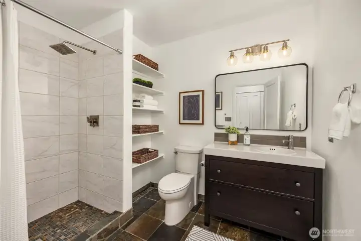 3/4 bathroom with walk-in shower.