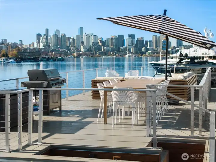 Unrivaled end-of-dock living with sweeping, unobstructed views of Lake Union & the Seattle skyline—this custom houseboat offers a truly unparalleled in-city waterfront lifestyle.