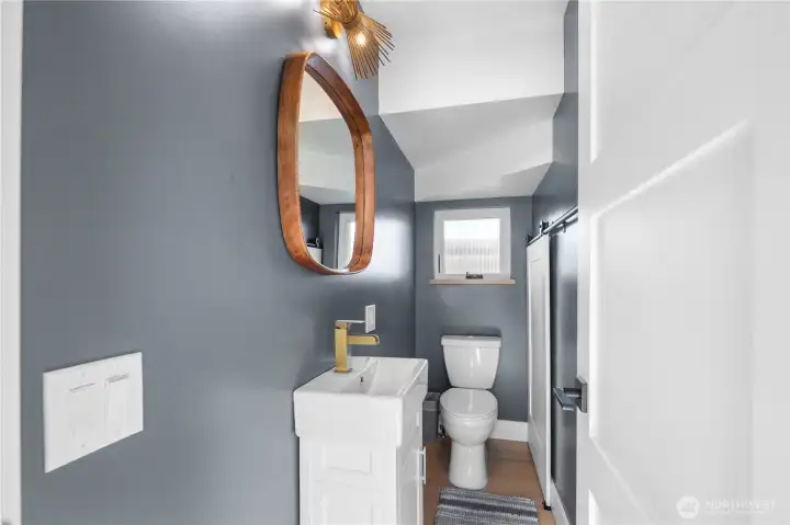 A convenient powder room on this level enhances functionality for everyday living & entertaining.