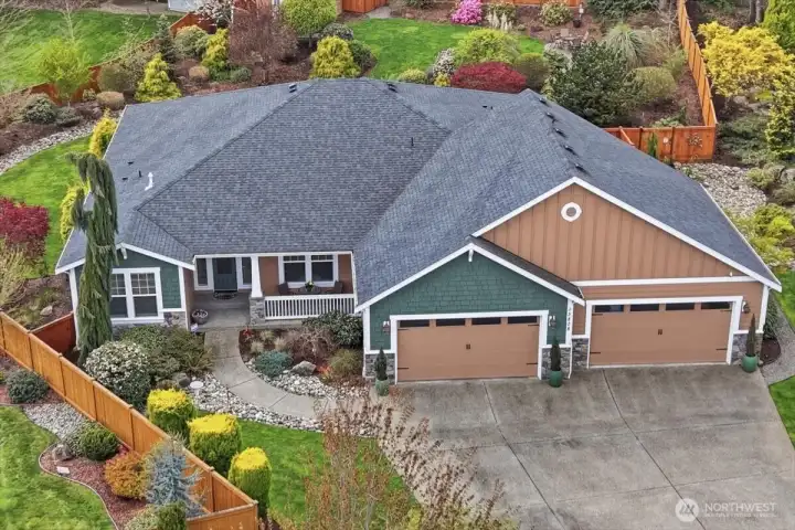 2,625 sq ft luxury rambler with breathtaking mountain views on an expansive, 1/2 acre lot. 3 bedrooms, 3 bathrooms, private den and 1,300 sq ft, 4-bay garage with additional overhead storage.