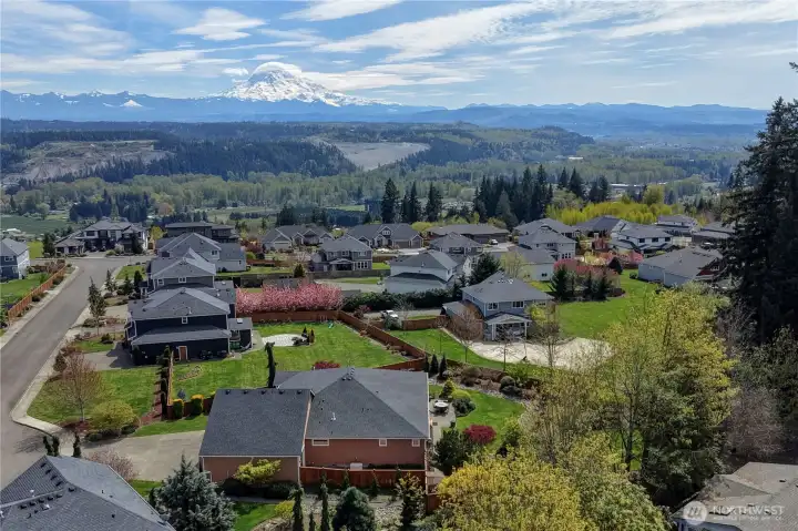 The neighborhood of Shawnee Ridge is known for having unobstructed, elevated views of the Orting Valley and Mount Rainier.