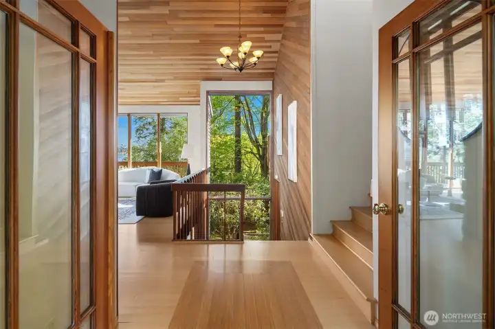 soaring ceilings and walls of windows.