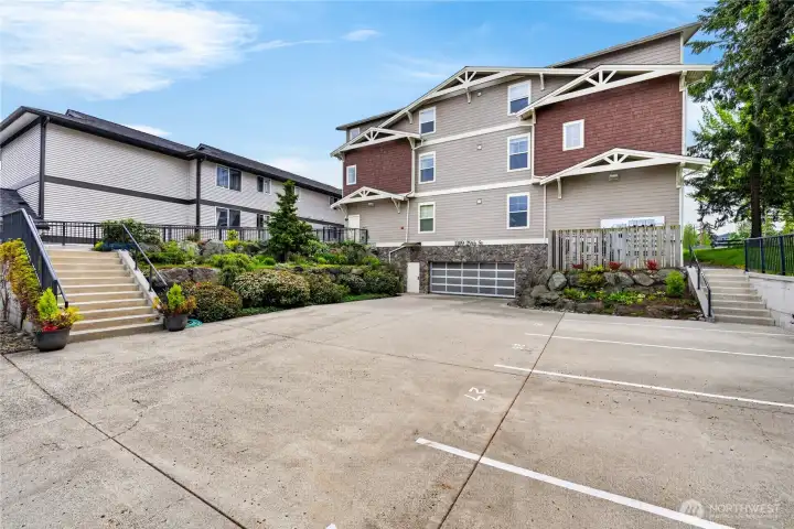 Front entry off 29th Street to The Residence at Storvik Park with easy access into the underground, secure parking garage for owners with additional off street parking.