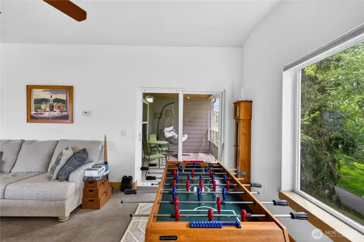 Slider off the living space opens to the private balcony.