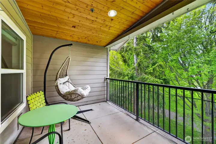 private balcony with beautiful wood detailing.
