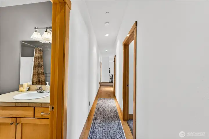 hallway looking from the front entrance towards the living space.
