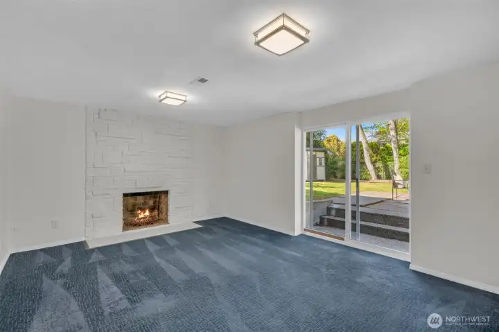 Family room downstairs leads to the back yard.