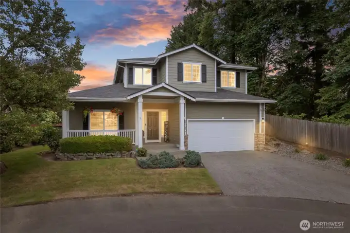 Beautiful professional landscaping and fresh exterior paint provide exceptional curb appeal from the moment you arrive.
