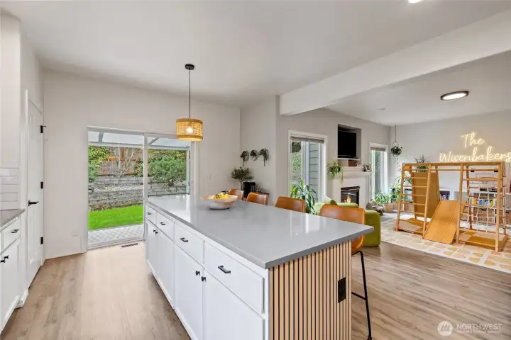 The spacious center island offers additional prep space, storage, and a natural gathering place for family and friends.