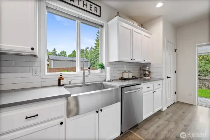 With abundant counter space, ample cabinetry, and an efficient layout, this kitchen is as functional as it is welcoming.