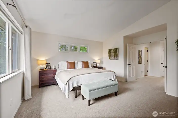 Generously sized and filled with natural light, the primary suite offers the perfect blend of comfort, privacy, and relaxation.