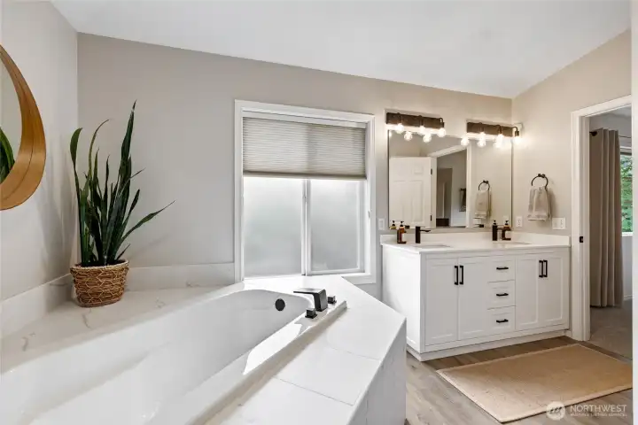Unwind after a long day in the relaxing jetted soaking tub, designed to create a spa-like retreat at home.