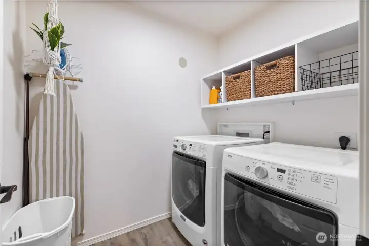 Conveniently located upstairs, the laundry room makes daily chores easier and more efficient.