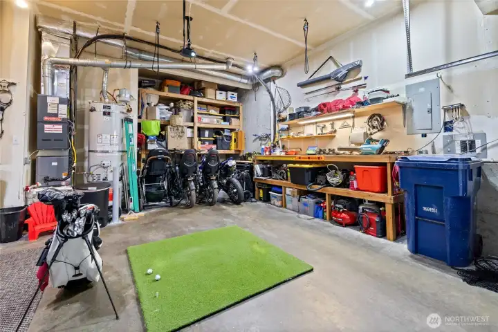 Custom wood shelving keeps tools, equipment, and seasonal items neatly organized.