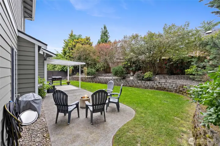 Step outside to a covered patio designed for year-round outdoor enjoyment.