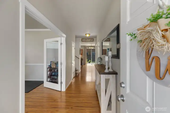Entryway with office/den with french doors on the left