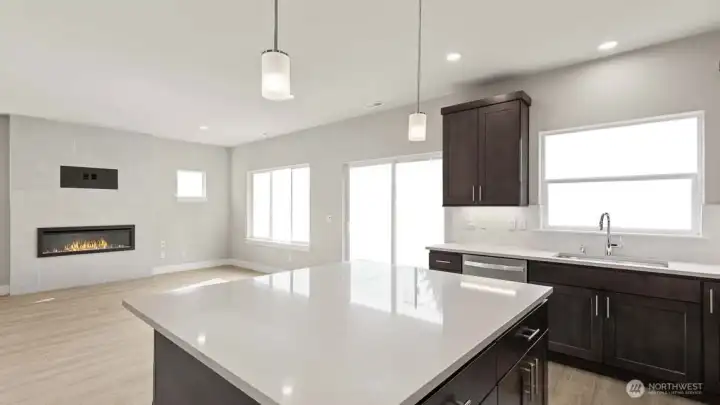Kitchen view into living room.Photos are for representation only.  Features, colors and selections may differ from photograph. See site agent for details.