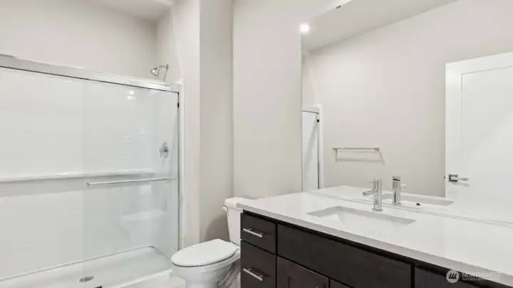 Main Floor Bathroom. Photos are for representation only.  Features, colors and selections may differ from photograph. See site agent for details.